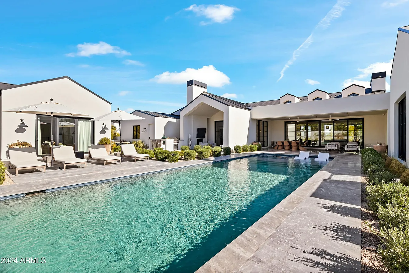 A modern white house with pool