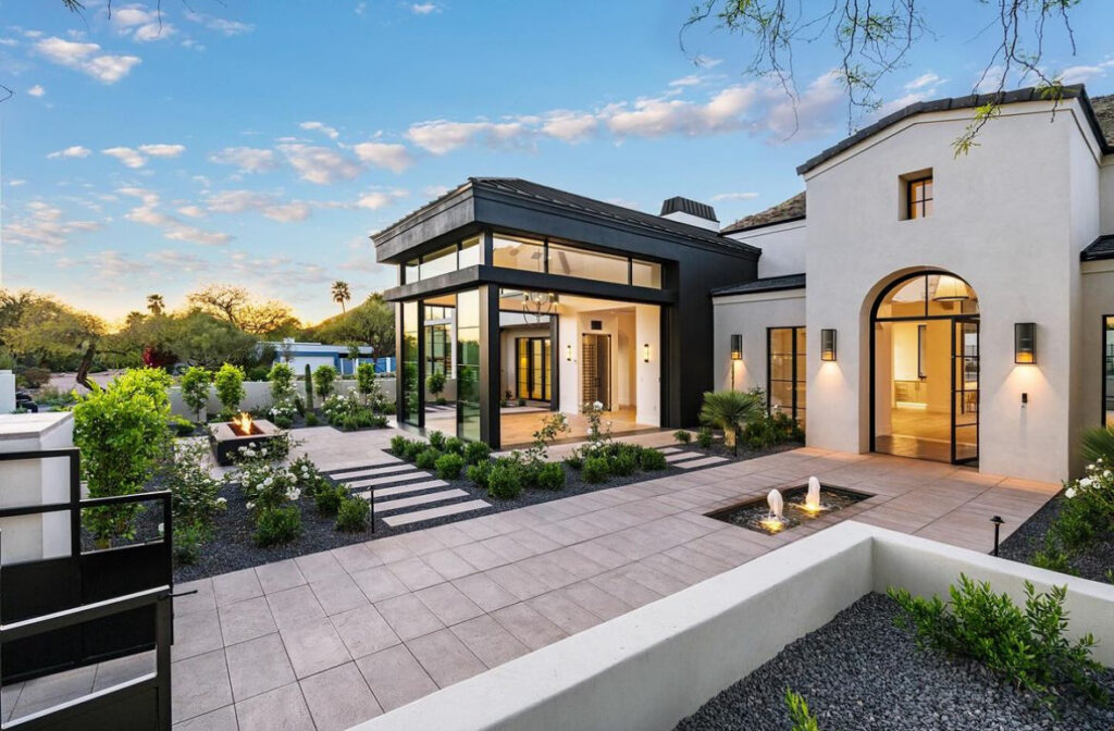 Pavilion with fountain and fire pit.