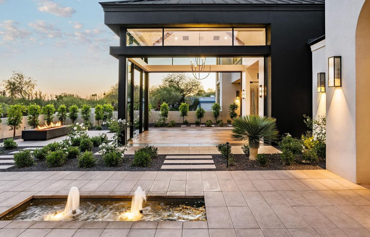 Pavilion with fountain and fire pit.